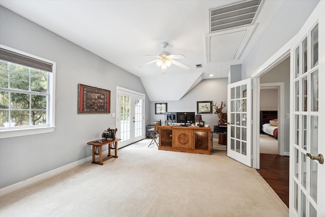 office space featuring carpet floors, french doors, visible vents, attic access, and vaulted ceiling