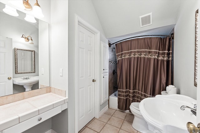 bathroom with visible vents, shower / bathtub combination with curtain, toilet, a sink, and tile patterned flooring