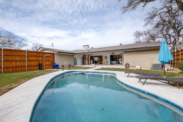 view of pool featuring a patio area, ceiling fan, fence, and a fenced in pool