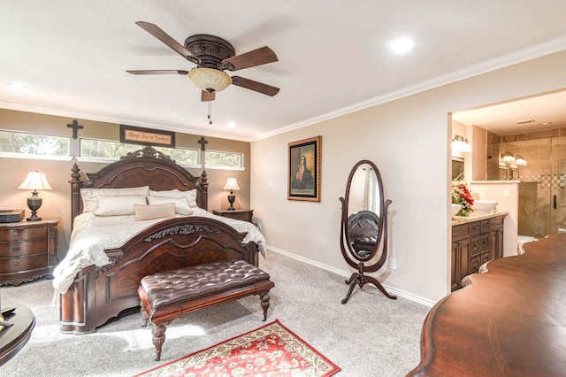 carpeted bedroom featuring connected bathroom, crown molding, baseboards, and a ceiling fan