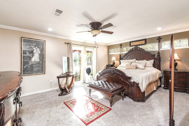 carpeted bedroom featuring baseboards, visible vents, ceiling fan, and crown molding