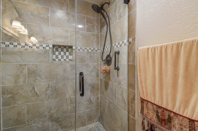 bathroom featuring a stall shower