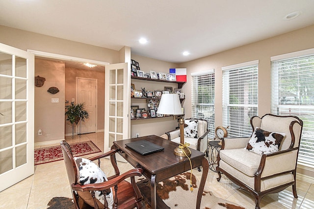 home office with recessed lighting, baseboards, light tile patterned flooring, and french doors