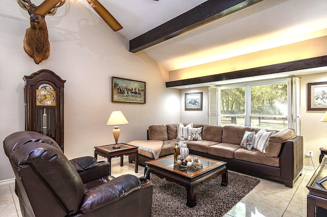 living room with vaulted ceiling with beams, baseboards, and light tile patterned flooring