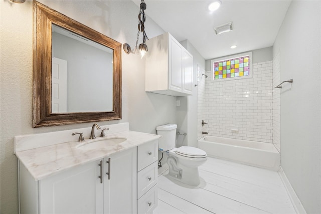 bathroom featuring visible vents, tub / shower combination, toilet, recessed lighting, and vanity