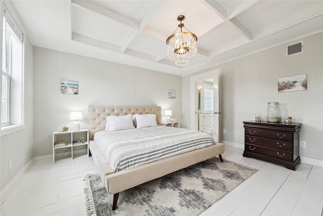 bedroom with baseboards, visible vents, coffered ceiling, an inviting chandelier, and beamed ceiling