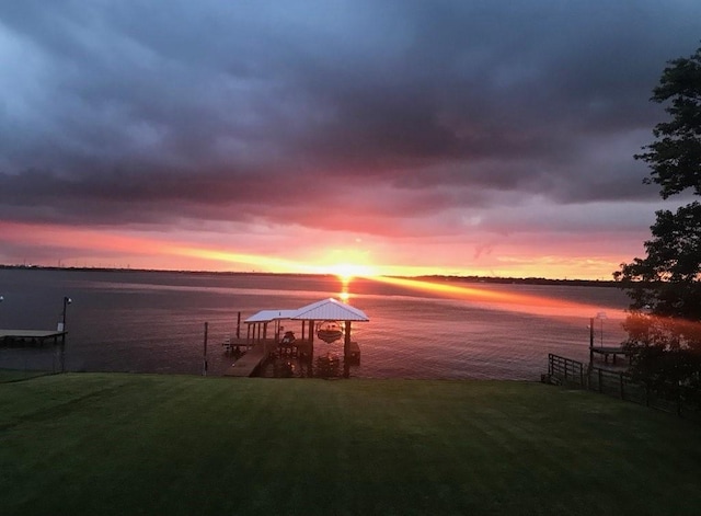438 S Burnett Dr, Baytown, TX 77520 - view of dock featuring a water view and a yard