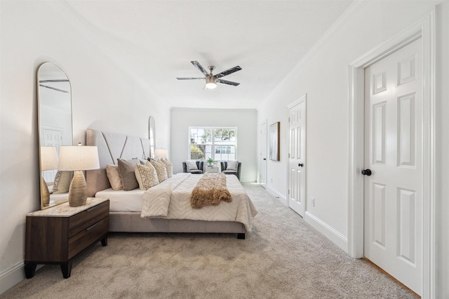 bedroom with baseboards, ceiling fan, and light colored carpet