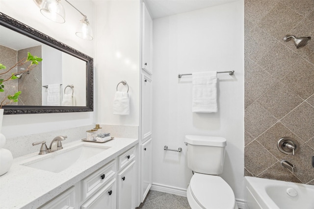 bathroom with shower / washtub combination, baseboards, vanity, and toilet