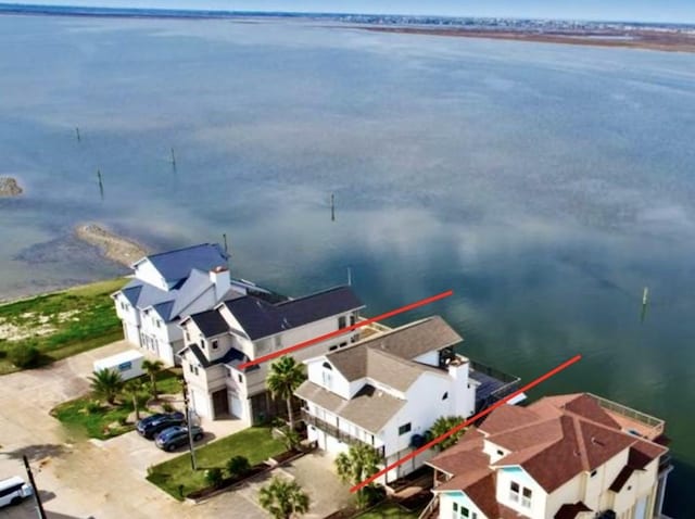 drone / aerial view featuring a water view