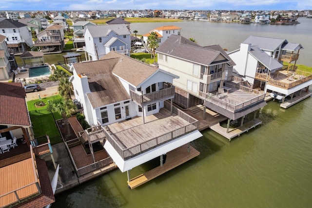 438 Jeanie Lynne Cir, Galveston, TX 77554 - aerial view of residential area with a nearby body of water