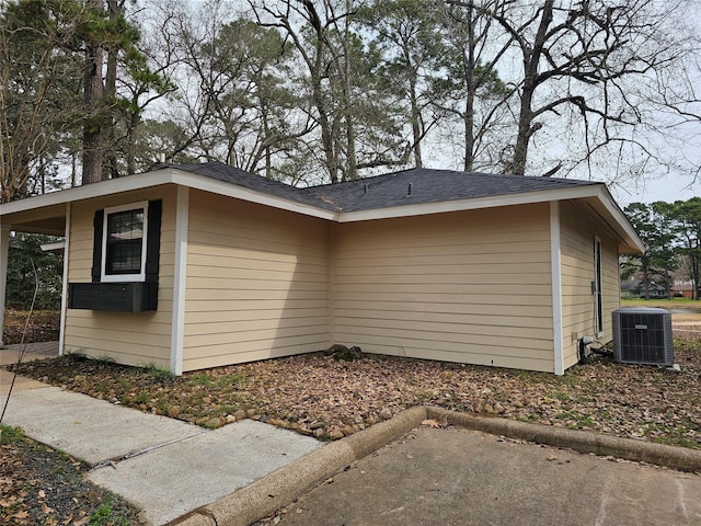 view of property exterior featuring central AC unit