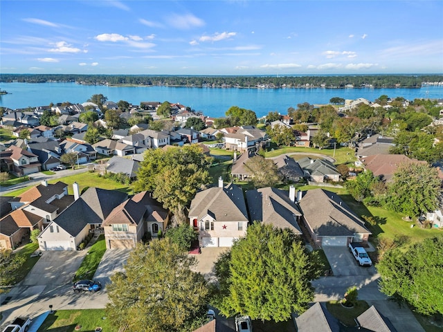 bird's eye view with a water view and a residential view