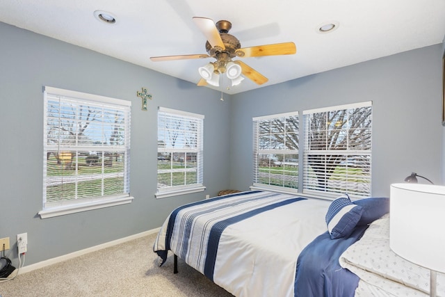 bedroom featuring a ceiling fan, carpet, baseboards, and recessed lighting