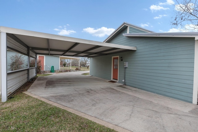 view of car parking featuring concrete driveway