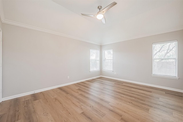 unfurnished room with light wood-style flooring, baseboards, ceiling fan, and crown molding