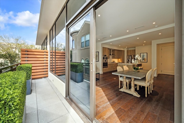 balcony with a sink and visible vents