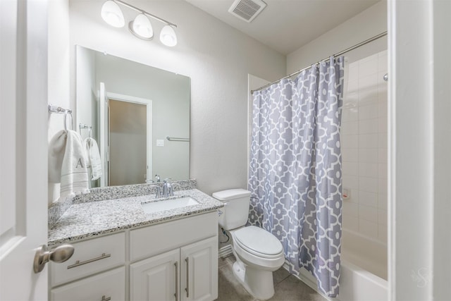 full bathroom featuring toilet, shower / bath combo, visible vents, and vanity