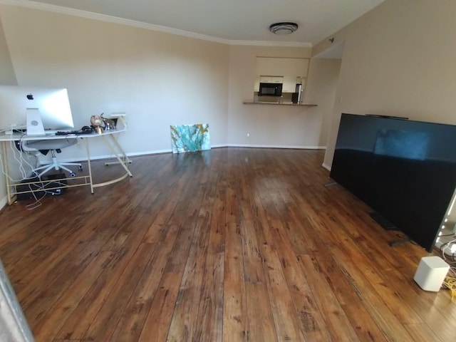 office featuring crown molding, baseboards, and hardwood / wood-style flooring