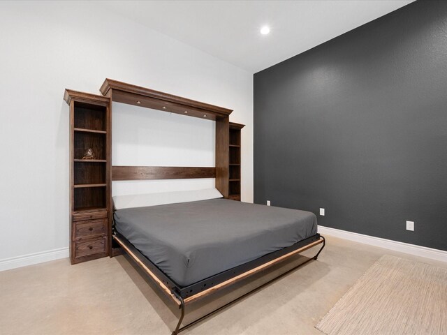 bedroom with recessed lighting, baseboards, and light carpet