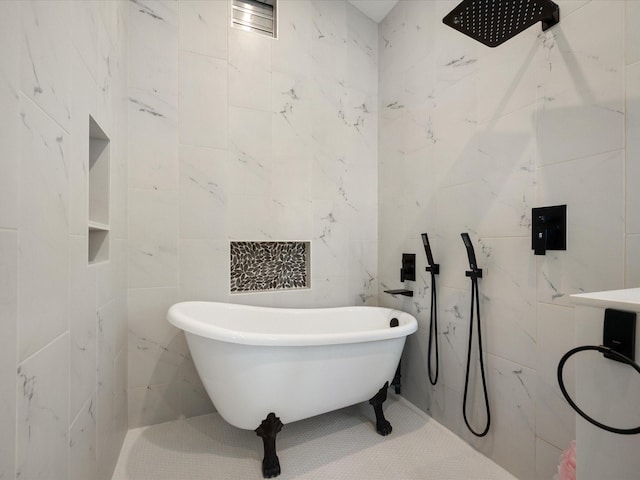 full bathroom featuring tile walls, a soaking tub, and walk in shower