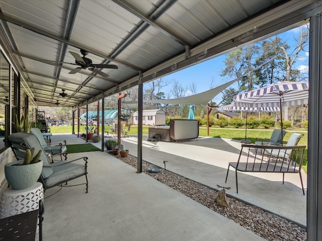 view of patio / terrace featuring a ceiling fan