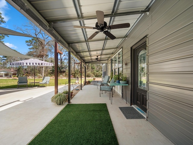 view of patio featuring a ceiling fan