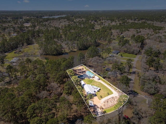 aerial view featuring a view of trees