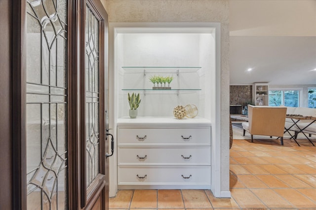 interior space with light tile patterned floors