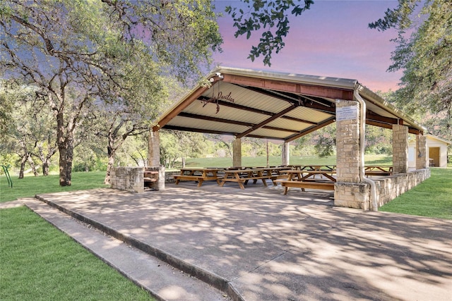 view of property's community featuring a yard and a gazebo