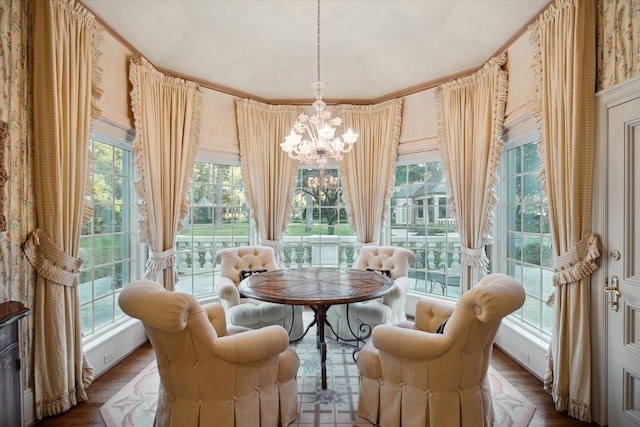 sunroom with a chandelier and a wealth of natural light