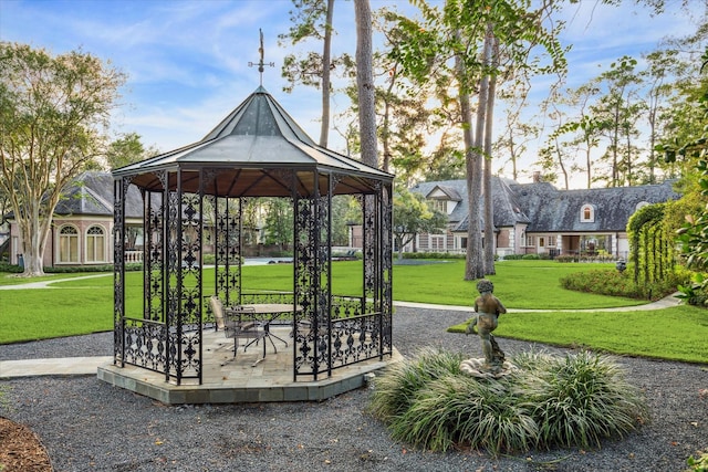 view of community featuring a yard and a gazebo