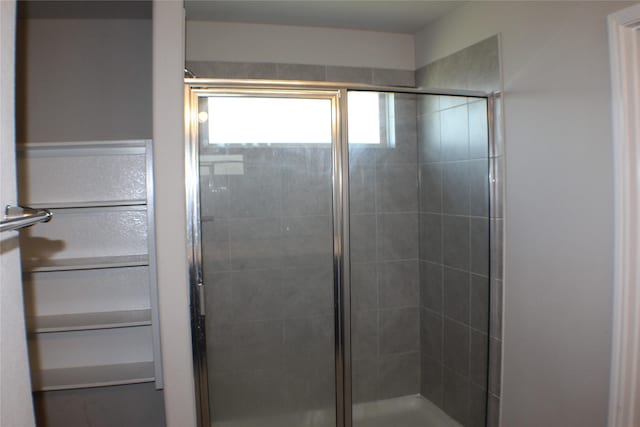 full bath featuring a stall shower