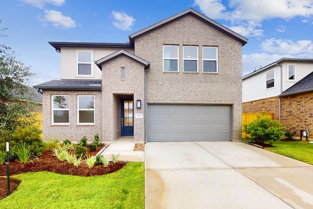 traditional-style house with a garage, brick siding, and a front lawn