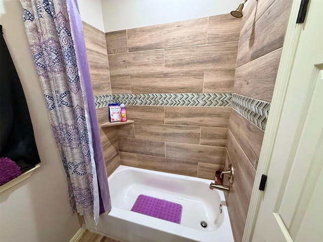 bathroom with shower / bath combo