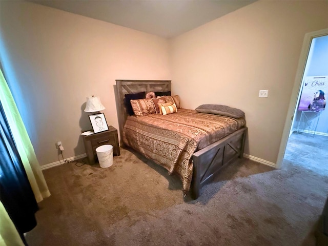 carpeted bedroom with baseboards