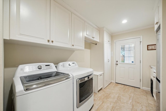 laundry area featuring washing machine and clothes dryer, recessed lighting, cabinet space, ornamental molding, and baseboards