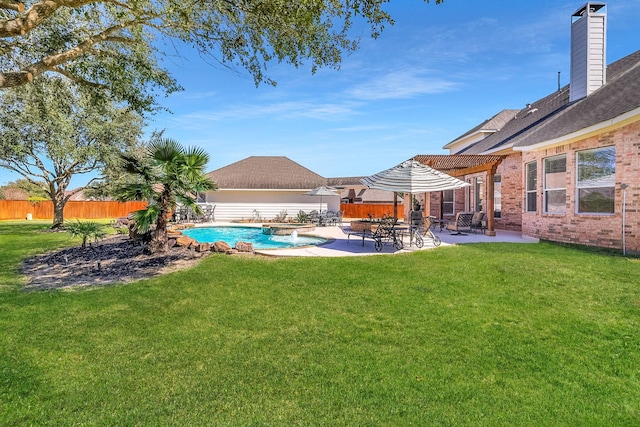 view of yard with a patio area, a fenced in pool, fence, and a pergola