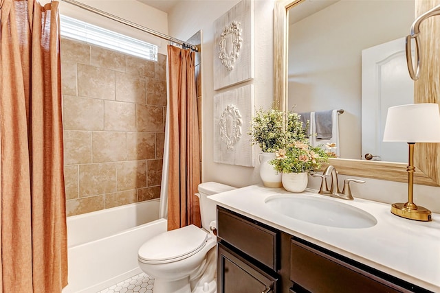 full bath featuring shower / tub combo with curtain, vanity, and toilet