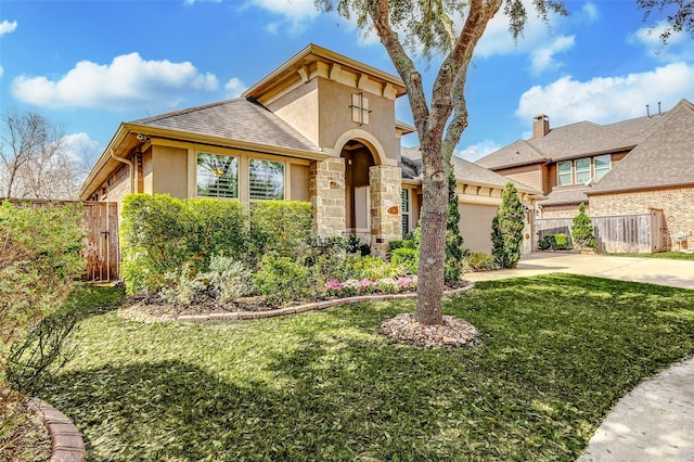 view of front of house featuring a garage, a shingled roof, concrete driveway, fence, and stucco siding