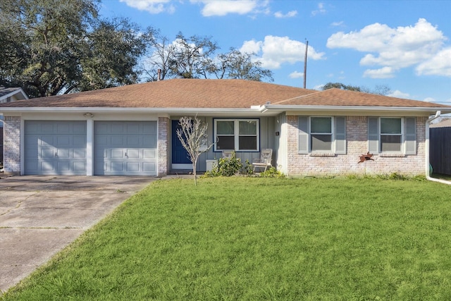 ranch-style house featuring brick siding, an attached garage, board and batten siding, driveway, and a front lawn