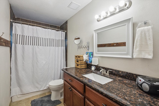 full bath featuring toilet and vanity