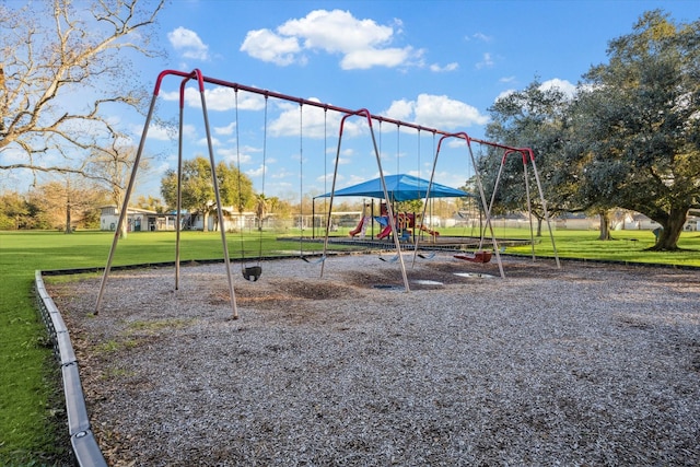 communal playground with a lawn