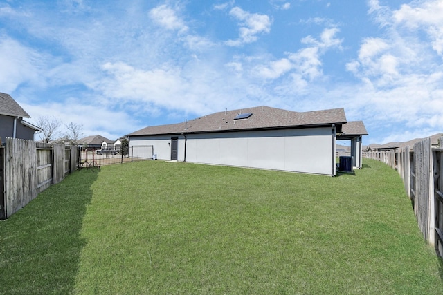 view of yard featuring a fenced backyard and cooling unit