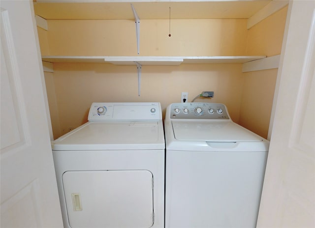 laundry area featuring laundry area and washing machine and clothes dryer