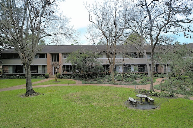 exterior space with a yard