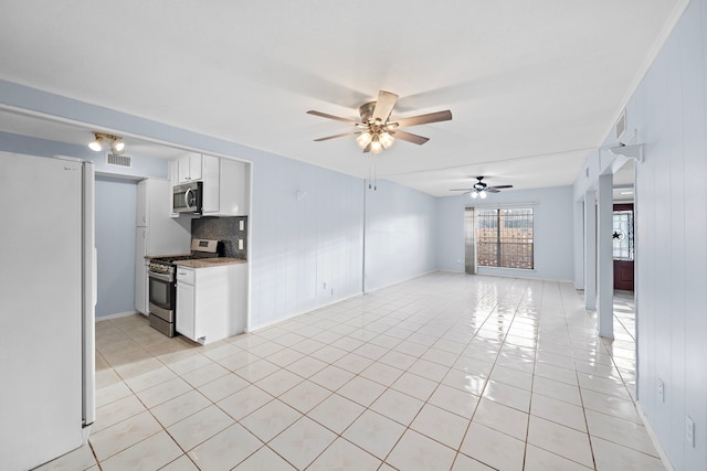 unfurnished living room featuring light tile patterned floors, ceiling fan, and visible vents