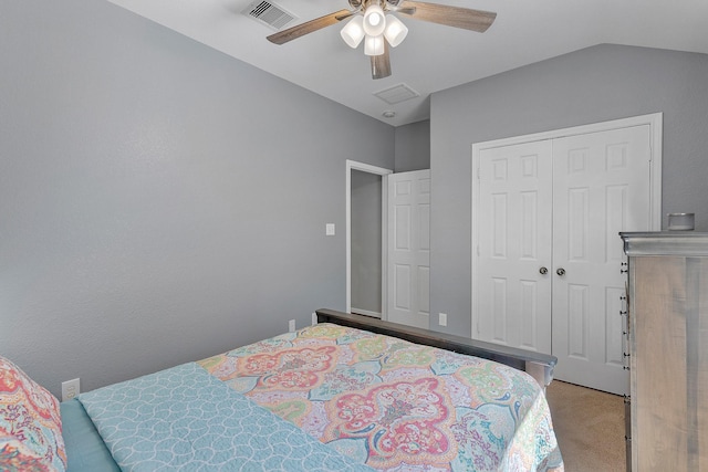 bedroom with light carpet, visible vents, a ceiling fan, lofted ceiling, and a closet