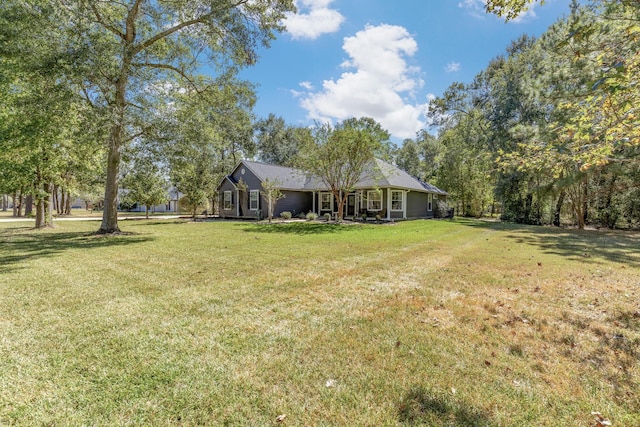 exterior space with a front lawn