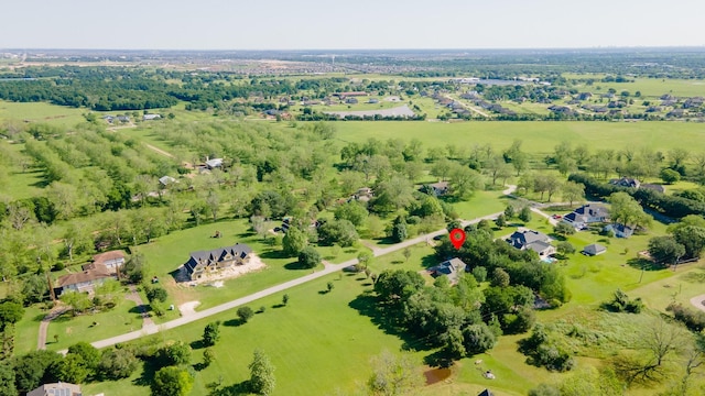 birds eye view of property featuring a rural view